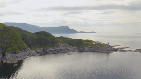 distant view of skongenes lighthouse in kinn municipality, vestland county, norway