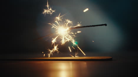 a sparkler burn in the dark room
