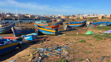 picturesque scene of boats moored in the sand on the shores of rabat bay