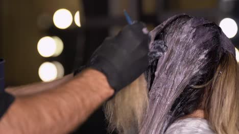 woman's hair dyeing