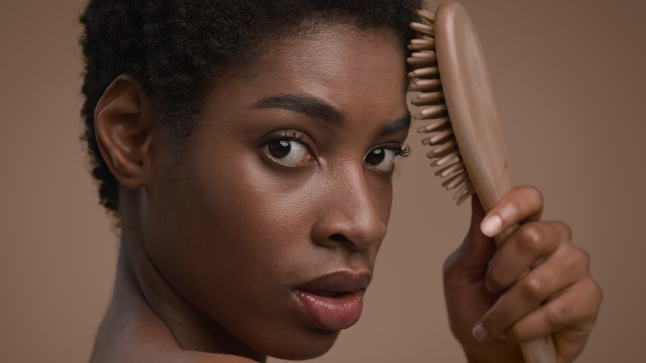 Woman with hairbrush