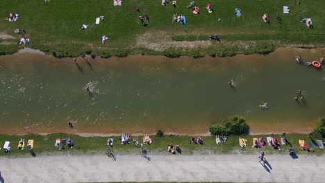 Great-aerial-top-view-flight-Oberstjägermeisterbach-river
English-Garden-Munich-Germany-Bavarian,-summer-sunny-blue-sky-day-23