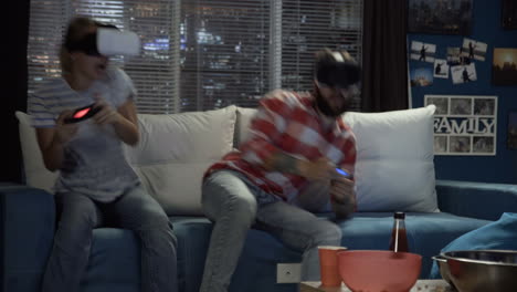couple playing vr games at home