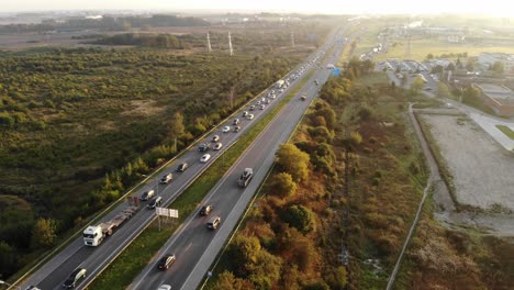 in the early autumn morning people go to town for work, and a traffic jam form