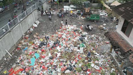 aerial overhead shot over a landfill in bali, indonesia