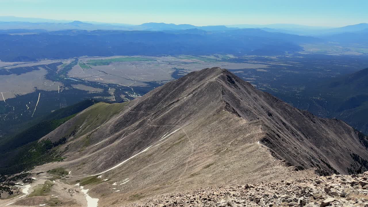 Chalk Cliffs Buena Vista Salida Mt Mount Princeton hiking trail 14er spring summertime Colorado Sawatch Range Arkansas River Rocky Mountains blue clear sky morning windy breeze grass pan left