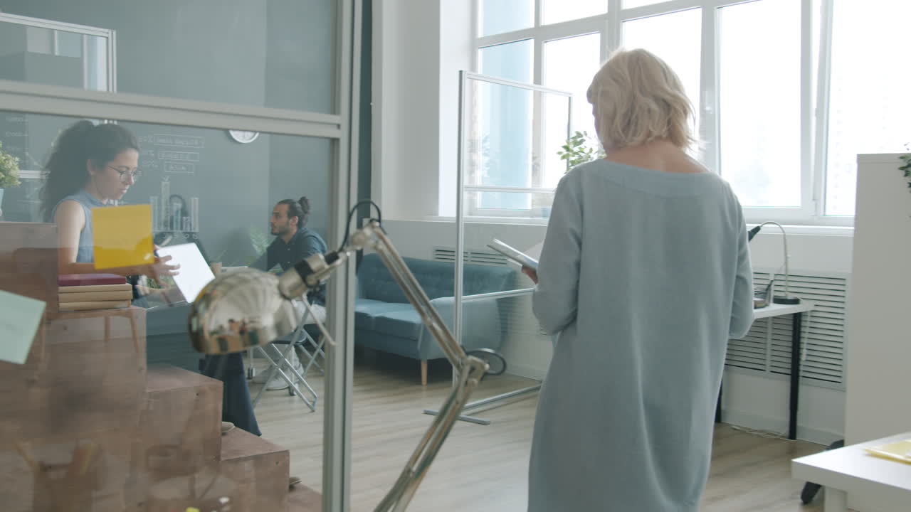 Business Meeting and Presentation in a Modern Office