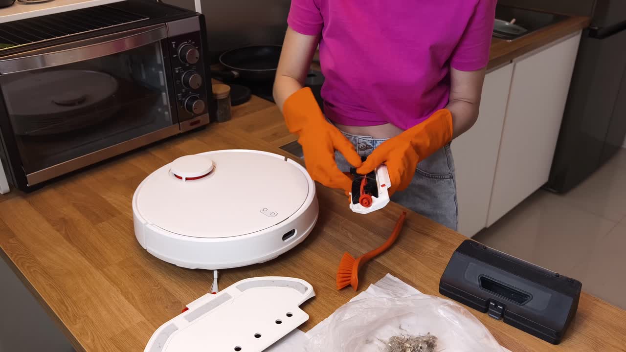 Cleaning a Robotic Vacuum Cleaner in a Kitchen