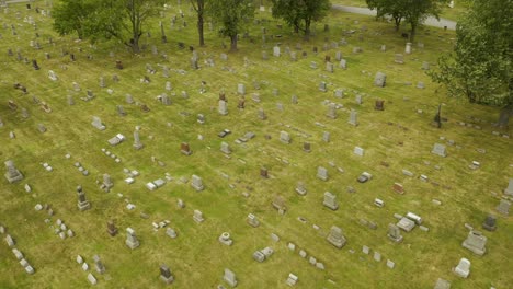 4k drone overhead aerial view of cemetery, drone over buffalo cemetery, pan down, rotate shot