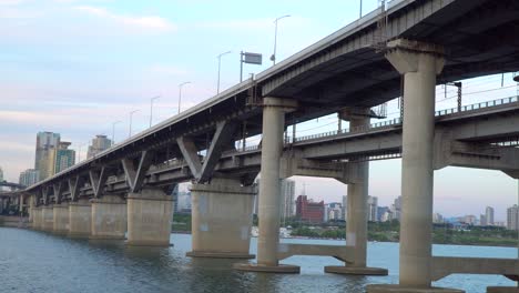 close up of cheongdam bridge with concrete pillars and double platform