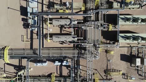 drone down shot of a hydraulic fracturing  pad