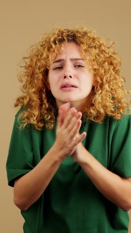 woman feeling cold, shivering, and trying to warm up
