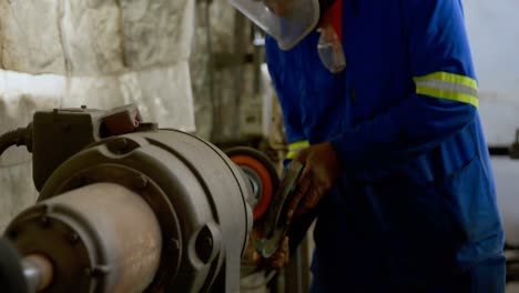 metalsmith working in workshop 4k