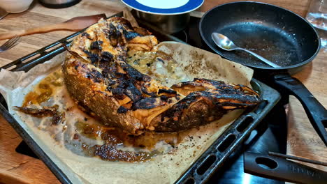 oven-roasted fish, cooked at home. close up