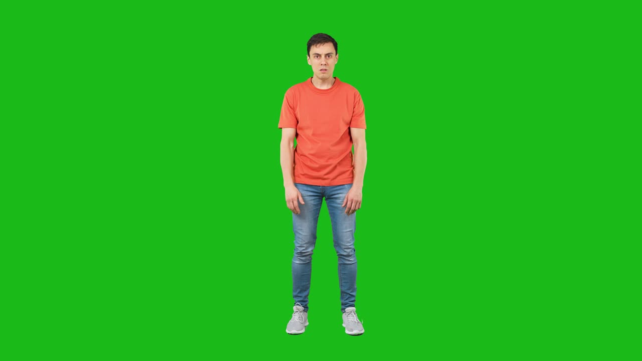 Surprised Man Standing on Green Screen