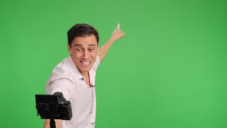 content creator sharing exciting news on green screen