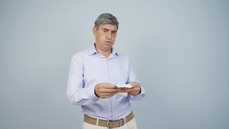 angry old man with high bill.
