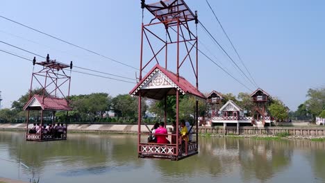 people enjoying a cable car ride