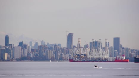 densely populated skyline of vancouver from port, long shot