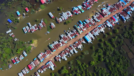 aerial orbit of the flooded fishing rural village kompong phluk, cambodia