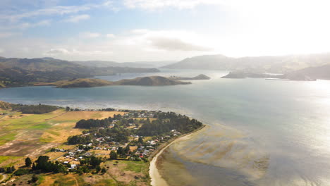 aerial view of a coastal town and scenic bay landscape