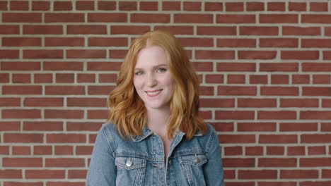 portrait of beautiful red head woman smiling cheerful feeling optimistic student indoors