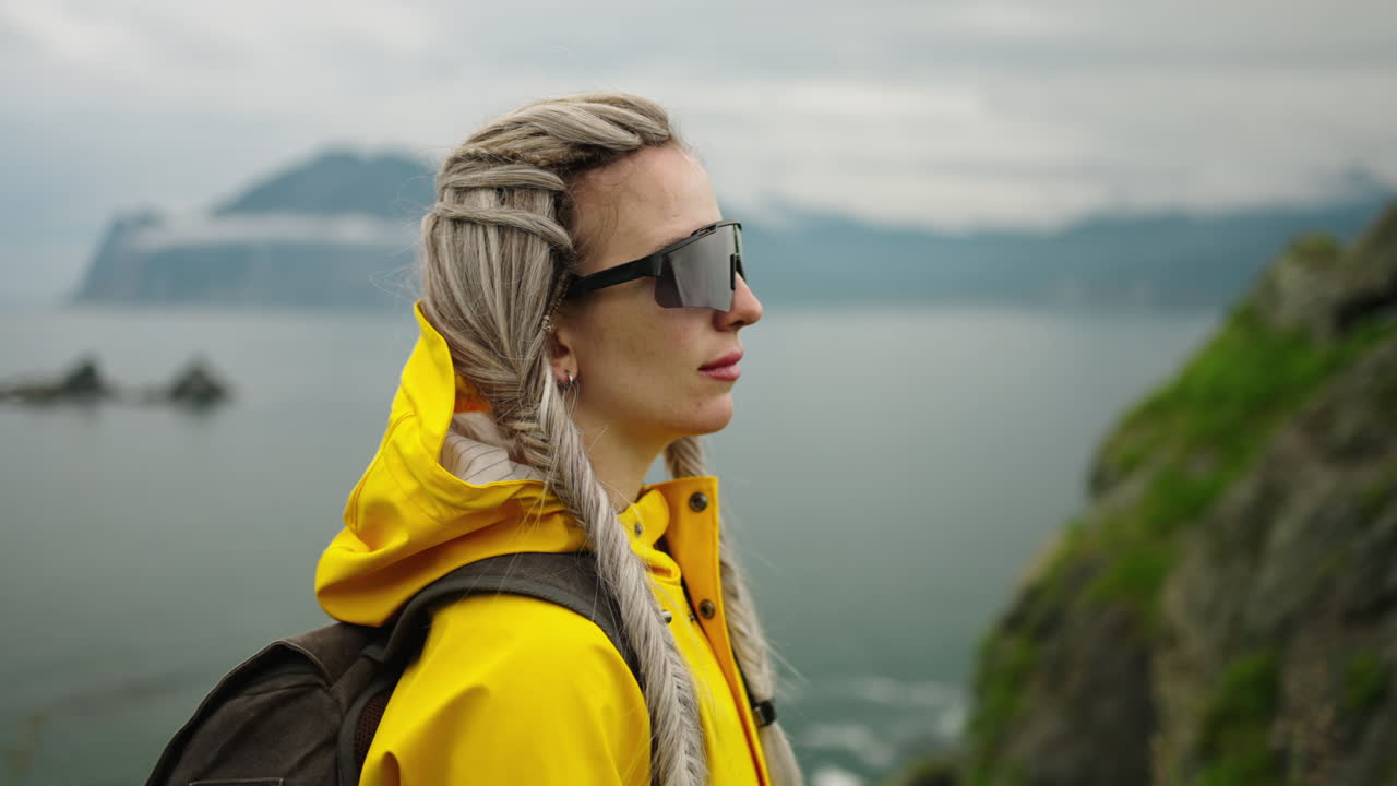 Woman Hiking on a Coastline