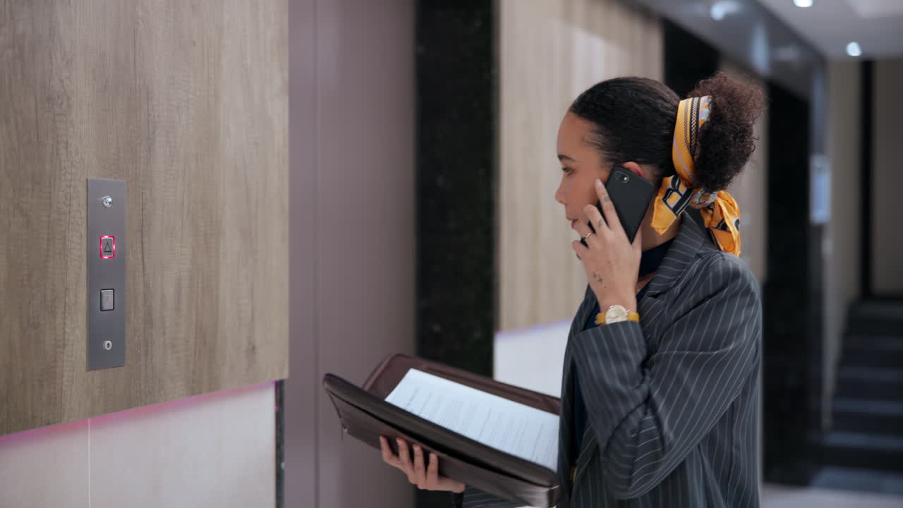 Woman on phone near elevator