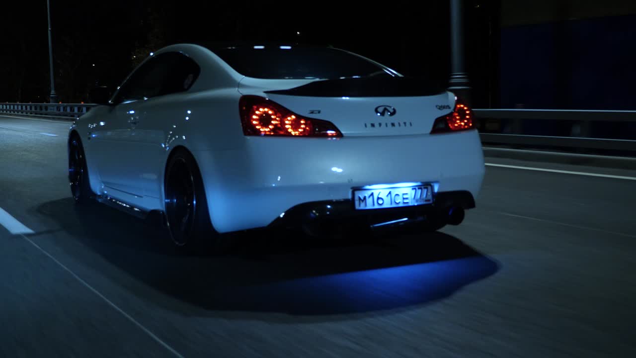 Car Driving on the Road at Night