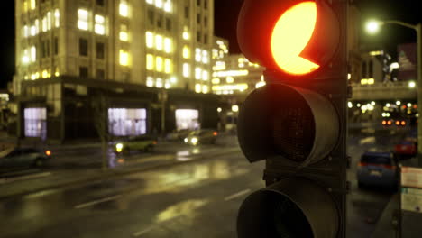 city traffic lights glowing red in urban area during nighttime