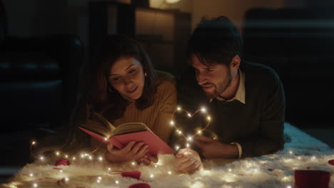 romantic couple reading a book for valentine's day