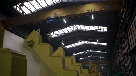 industrial factory interior with crane and machinery