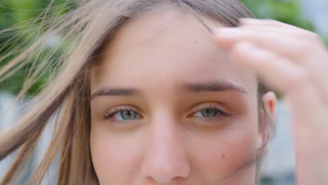 Woman-showing-disapproval-or-disbelief-through-her-facial-expression,-static-closeup