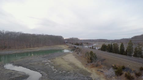 Aerial-Forward-Dolly-Shot-of-Train-Passing-By