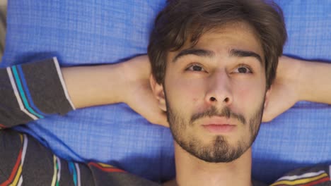 Portrait-of-happy-young-man.-To-dream.