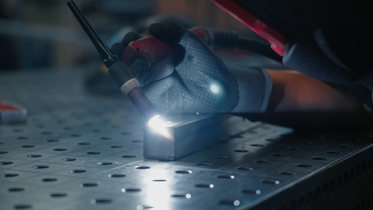 Close-up of a welder working on a metal piece