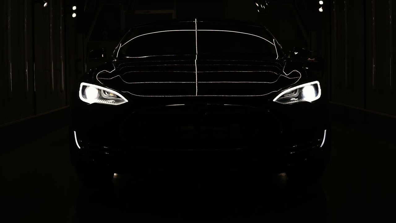 Turning on the light in car center with unrecognizable car in it