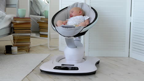 modern high-tech rocking chair helps parents put the child to bed. white interior of children's room