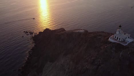 sunset reveal saw from the akrotiri lighthouse in santorini