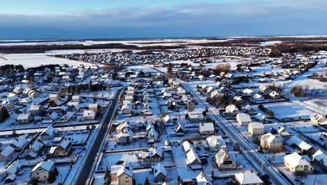 Large-suburban-area-covered-in-snow,-a-beautiful-winter-scene