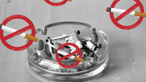 animation of cigarettes icon with prohibition sign over ashtray on grey background