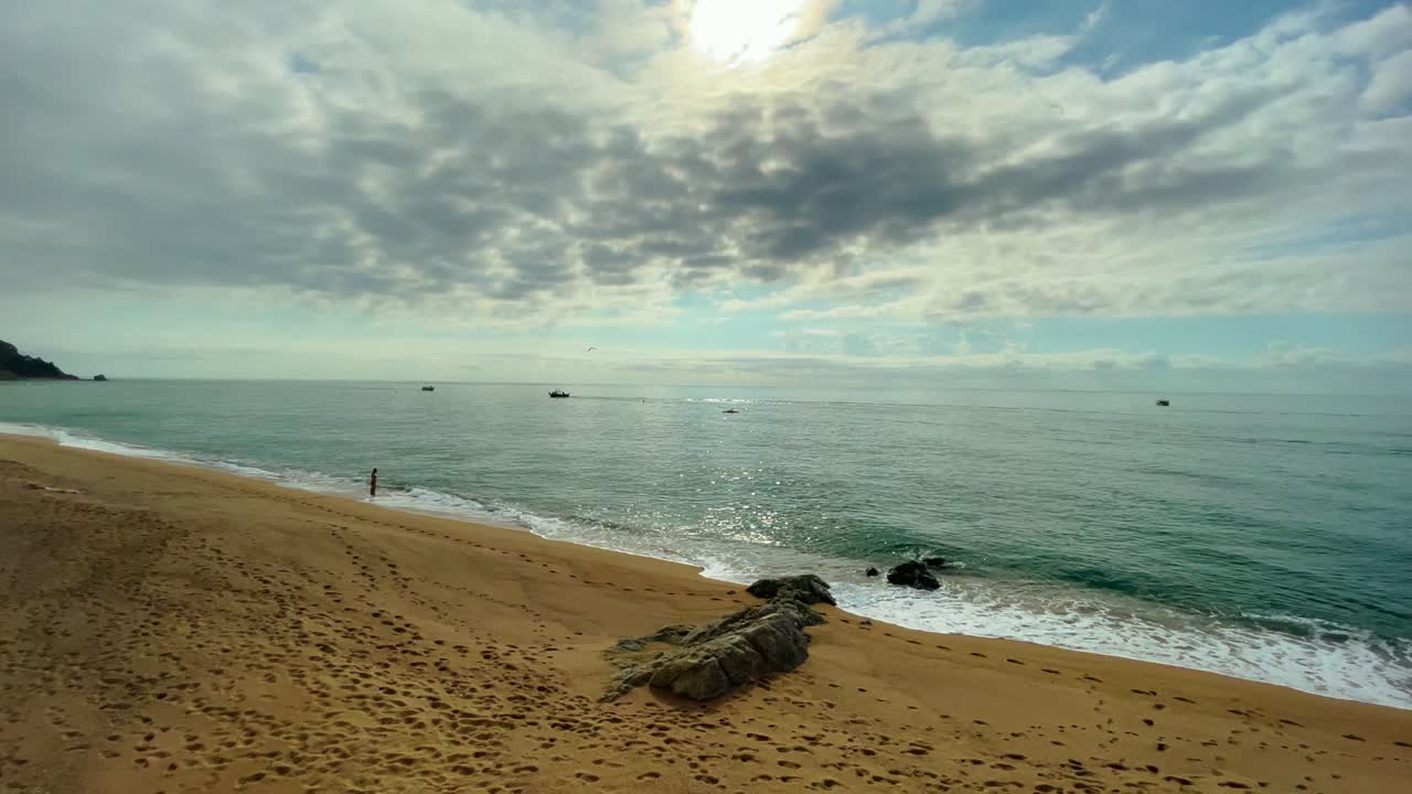 Sant Pol de Mar promenade overlooking the Mediterranean ocean Maresme tourism beaches in Barcelona traveling shoot gimbal