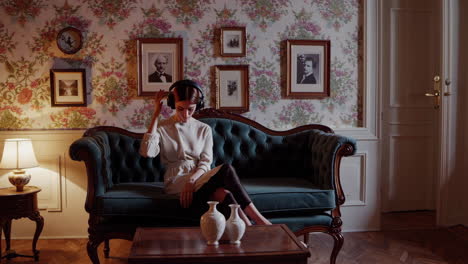 woman listening to music in a vintage living room