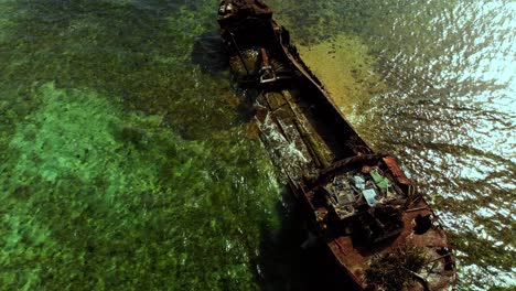 Bird's-eye-view-of-an-epic-shipwreck-on-a-reef-near-the-Caribbean-island-of-Carriacou,-Grenada