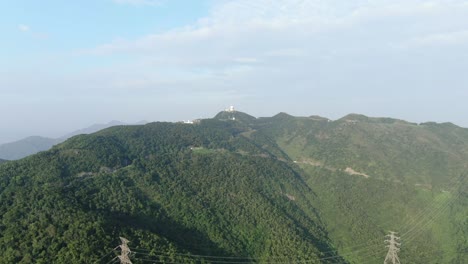 locals at lion rock country park summit on a beautiful day, aerial footage