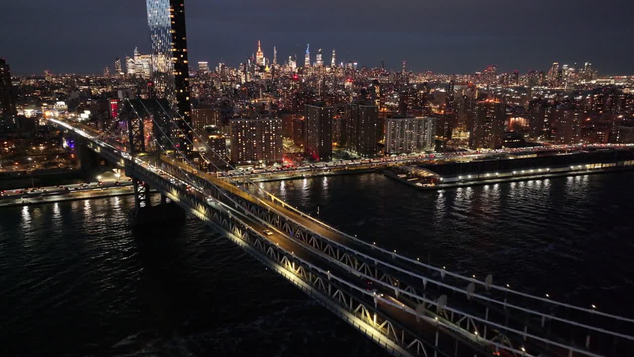 Night Scape Of Manhattan Bridge At Brooklyn In New York United States. City At Night Scene. Illuminated Bridge Landscape. Manhattan Bridge At New York United States. Highrise Buildings.