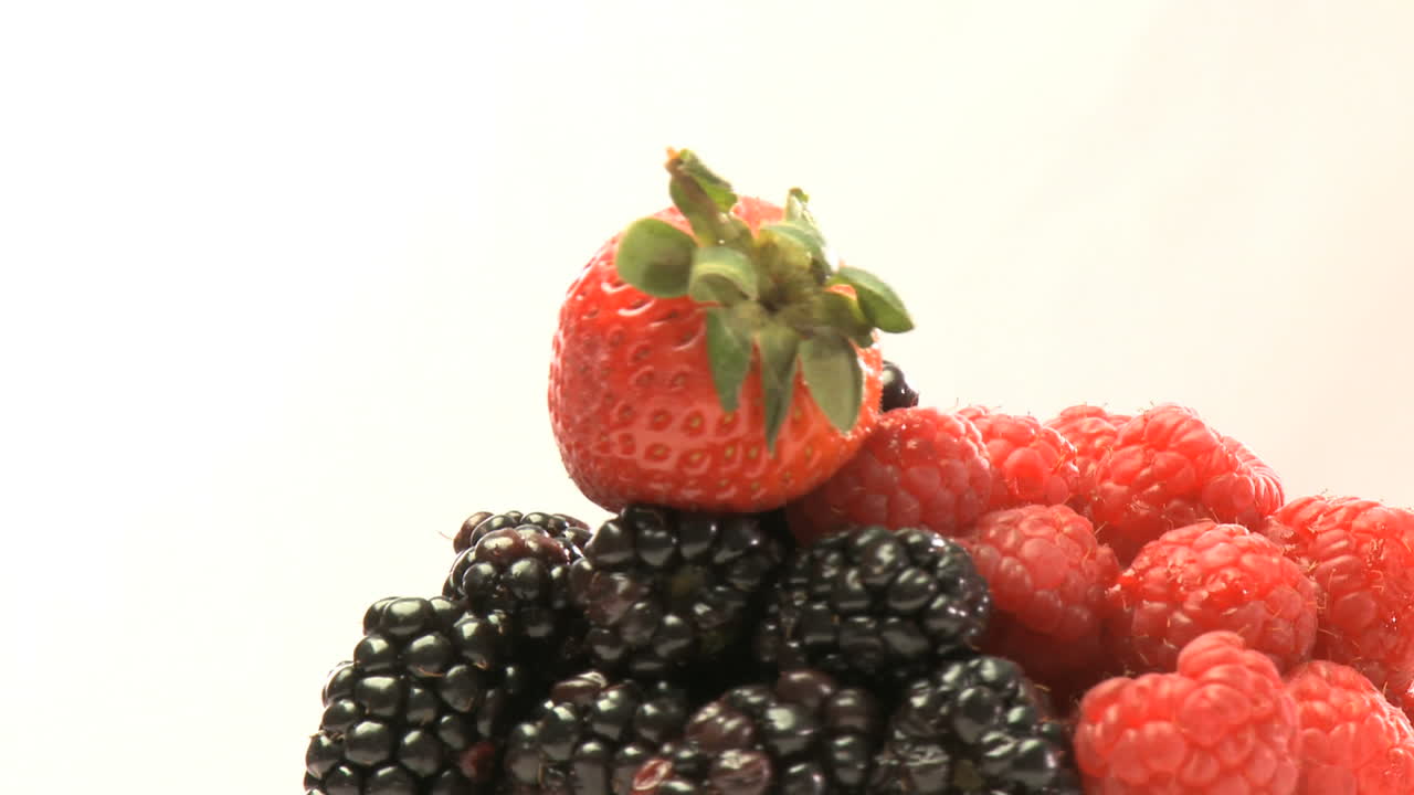 Rotary cluster of blackberries and strawberries