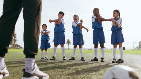 children, stretching and sport on soccer field