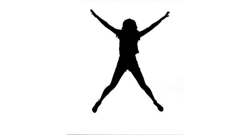 Silhouette-woman-jumping-in-slow-motion