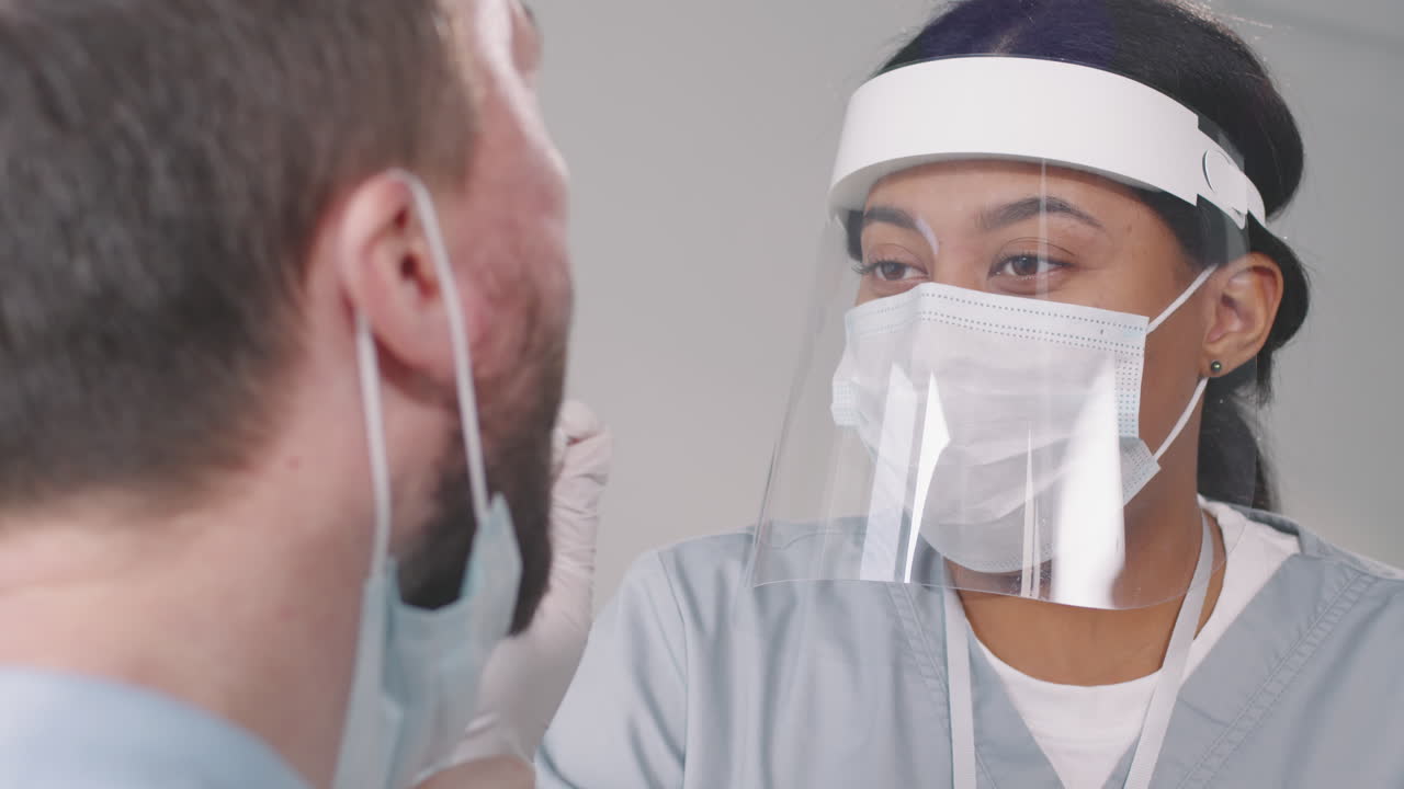 Nurse Taking Throat Swab